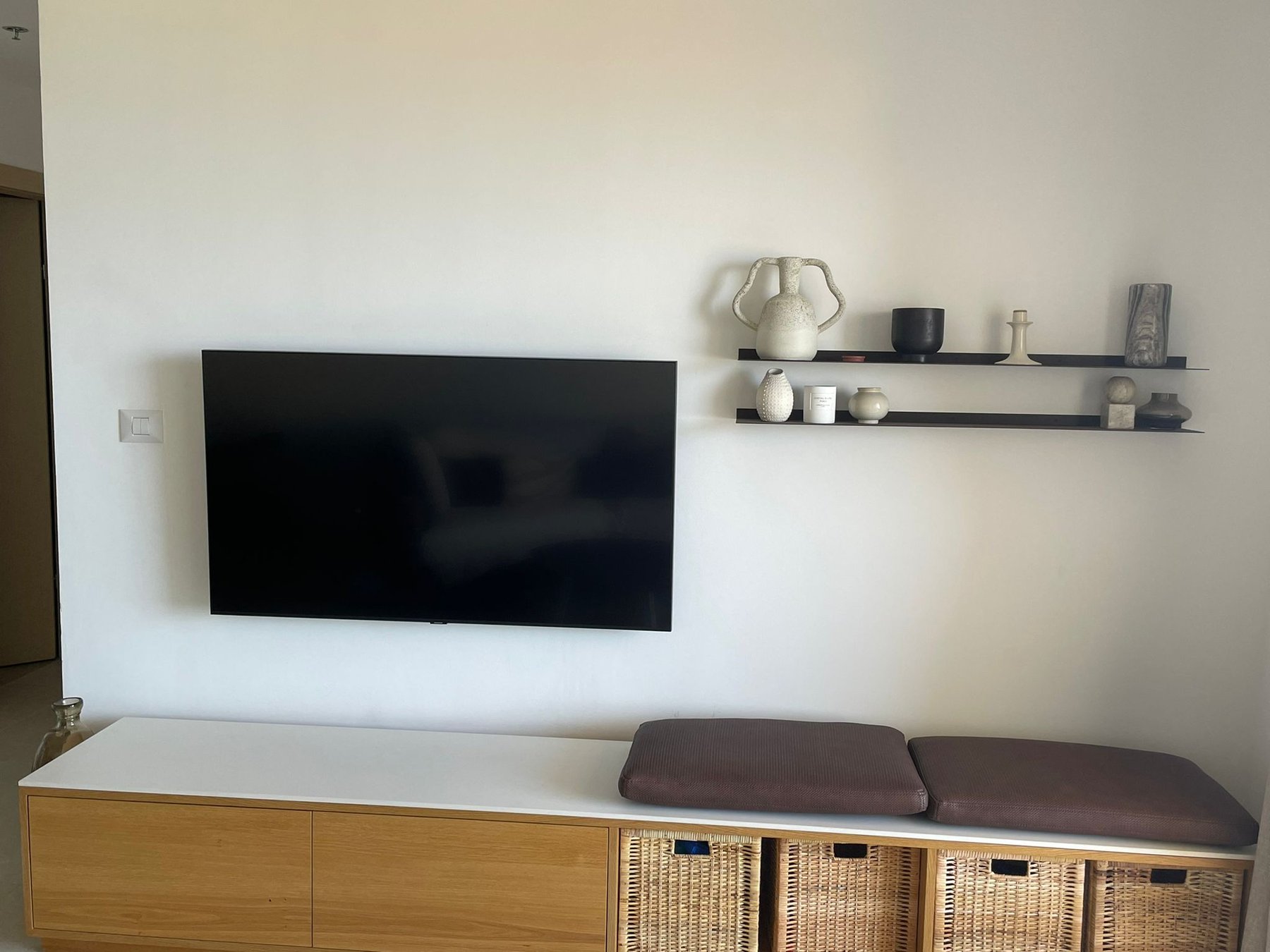 Designer TV unit with curated décor