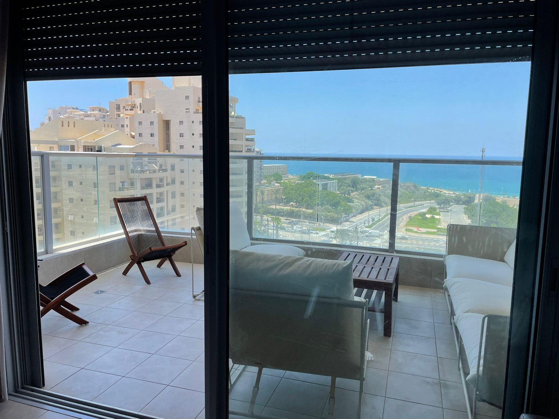 Terrace seen from the living room with sea view