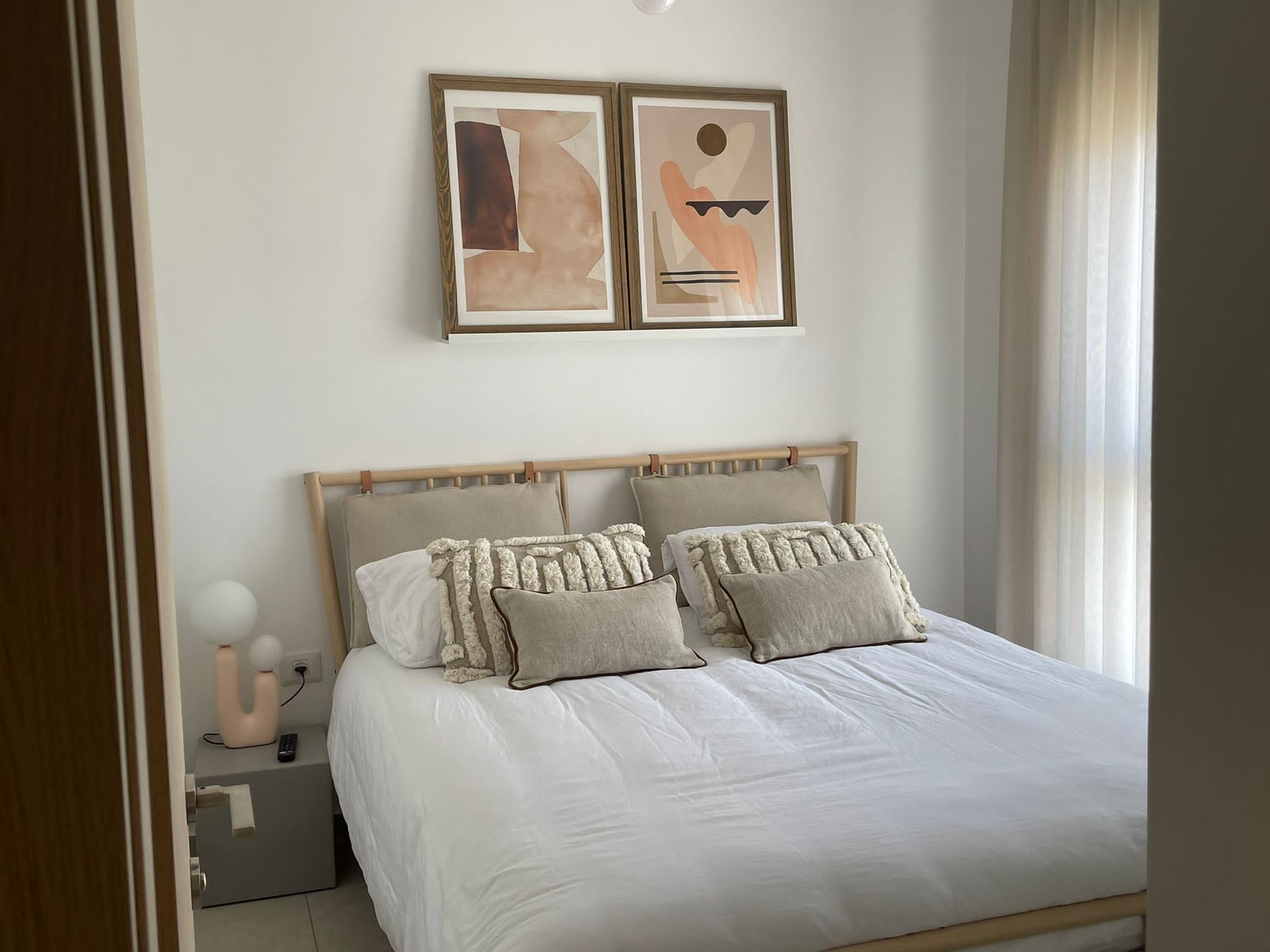 Master suite with curated art frames